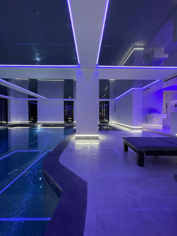 Luxury indoor pool with bespoke stretch ceiling design