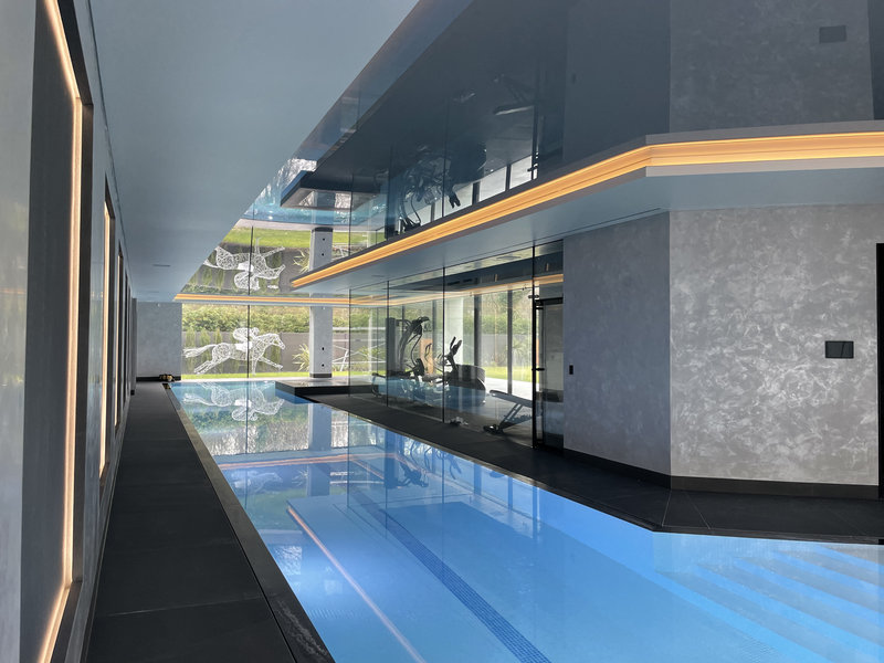 Residential stretch ceiling with ambient lighting