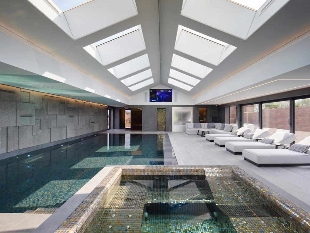 Indoor pool with feature stretch ceiling lighting